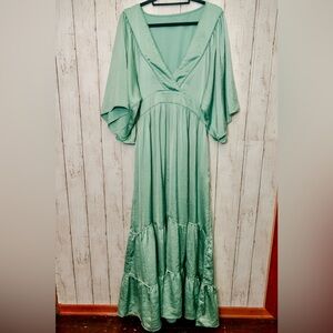 Beautiful boho sea foam green dress with flutter sleeves and pockets!